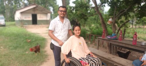 Sabina in a wheelchair